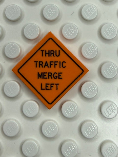 Work Signs 2x2 Tile: Thru Traffic Merge Left